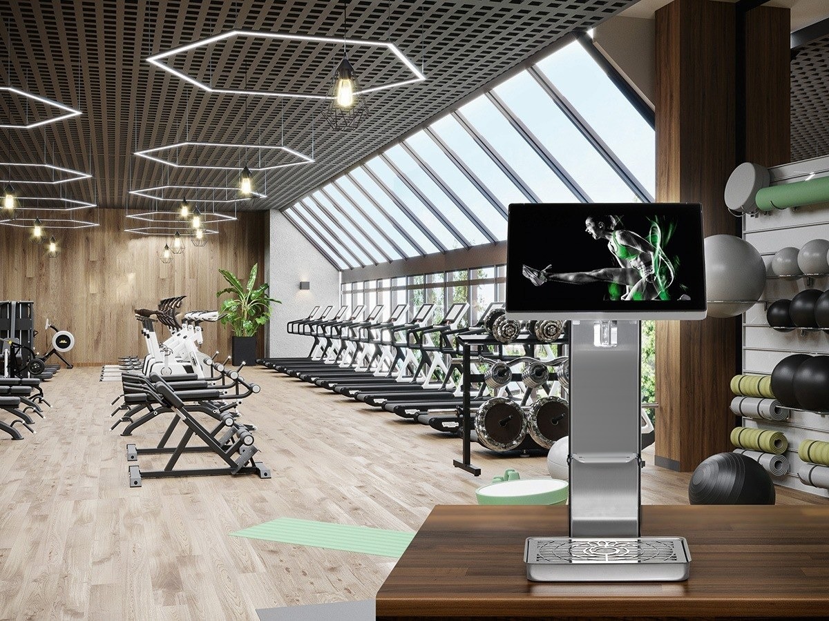 Station d'hydratation au cœur d'un espace fitness